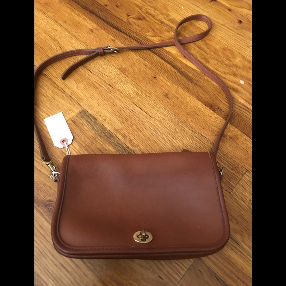 Brown Coach cross body bag.